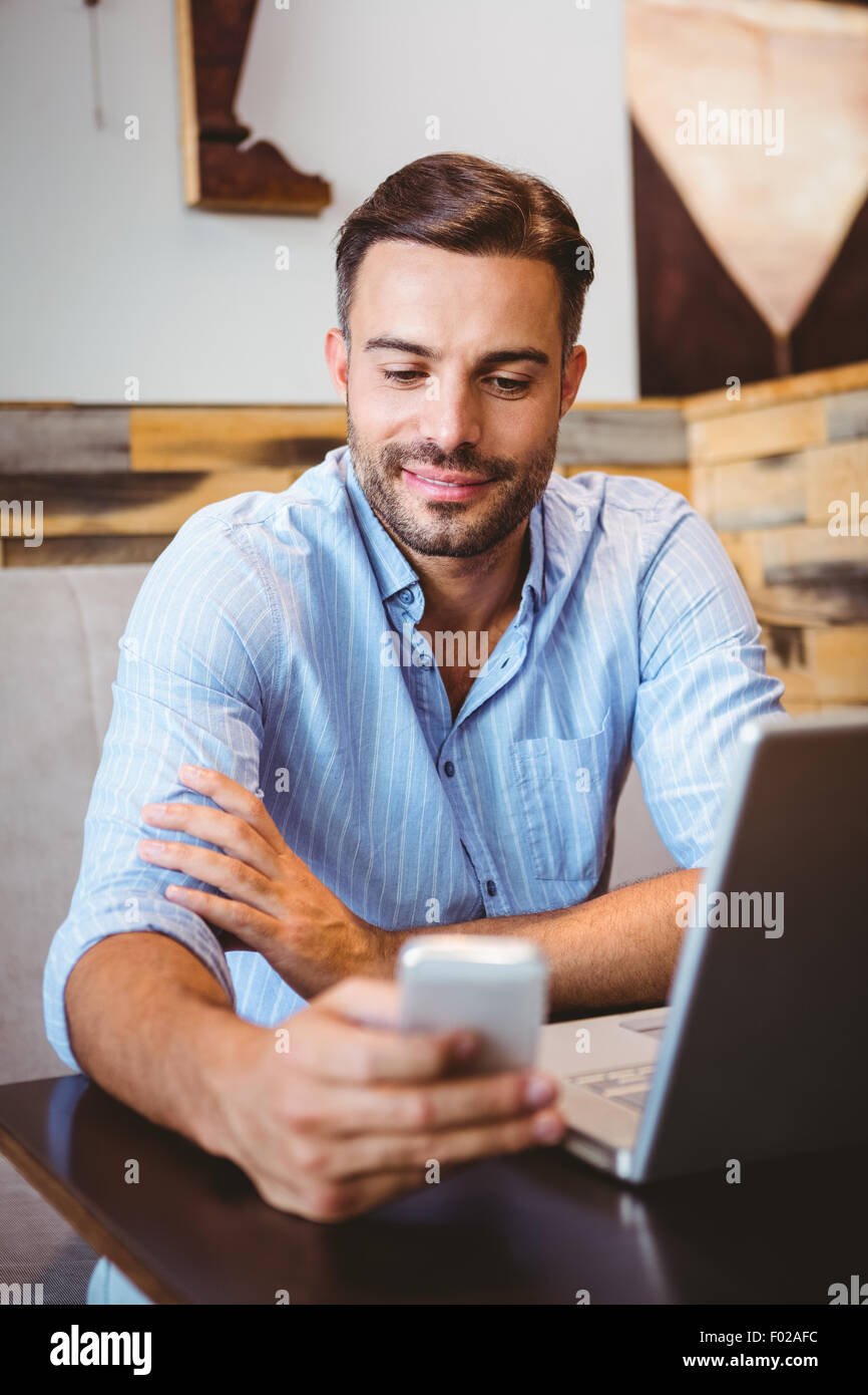 Smiling Businessman Sending A Text Message Stock Photo Alamy smiling-businessman-sending-a-text-message-stock-photo-alamy