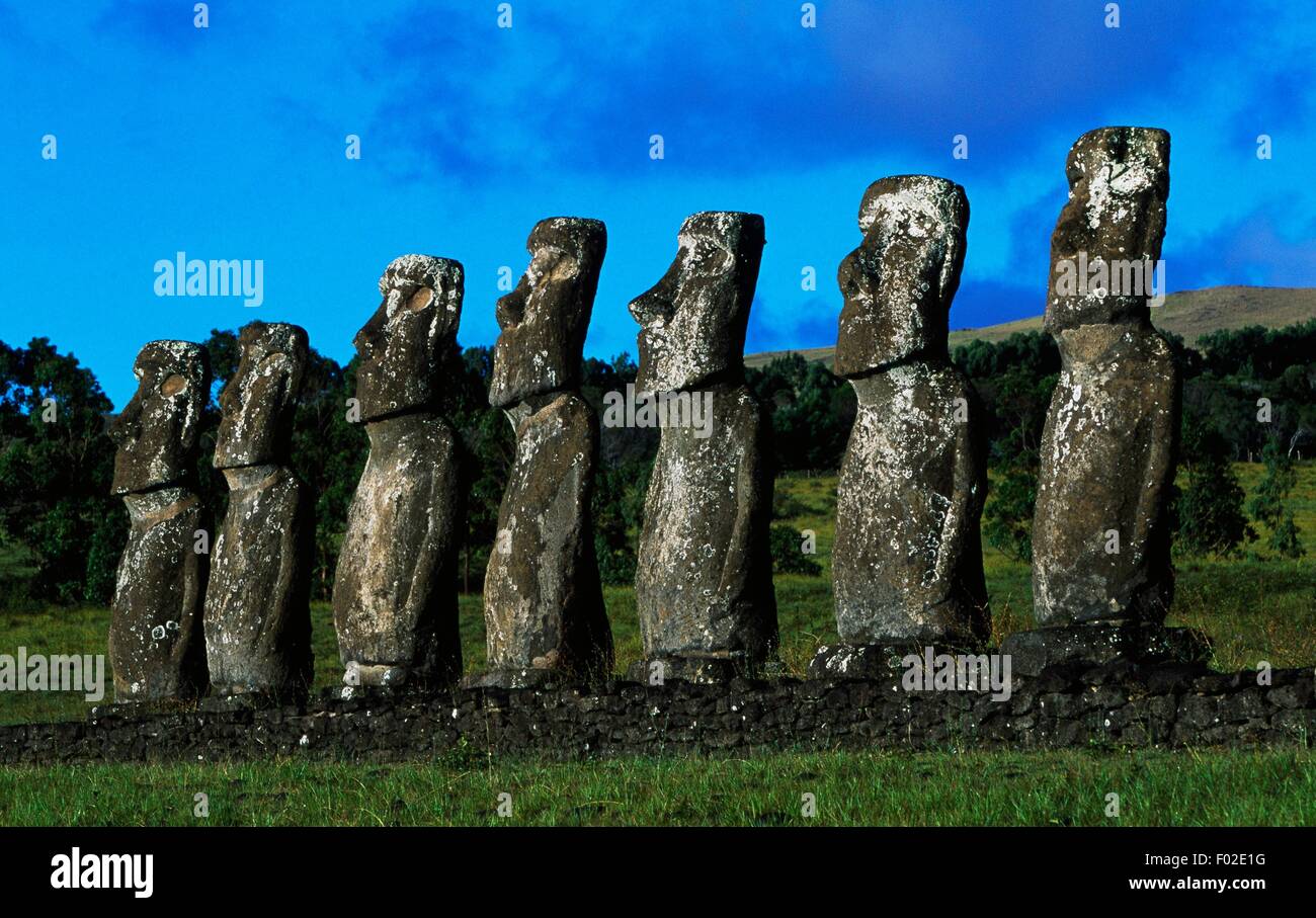 Seven Moai (anthropomorphic monolith sculpture), Ahu Akivi, Rapa-Nui National Park (UNESCO World Heritage List, 1995), Easter Island, Chile. Stock Photo