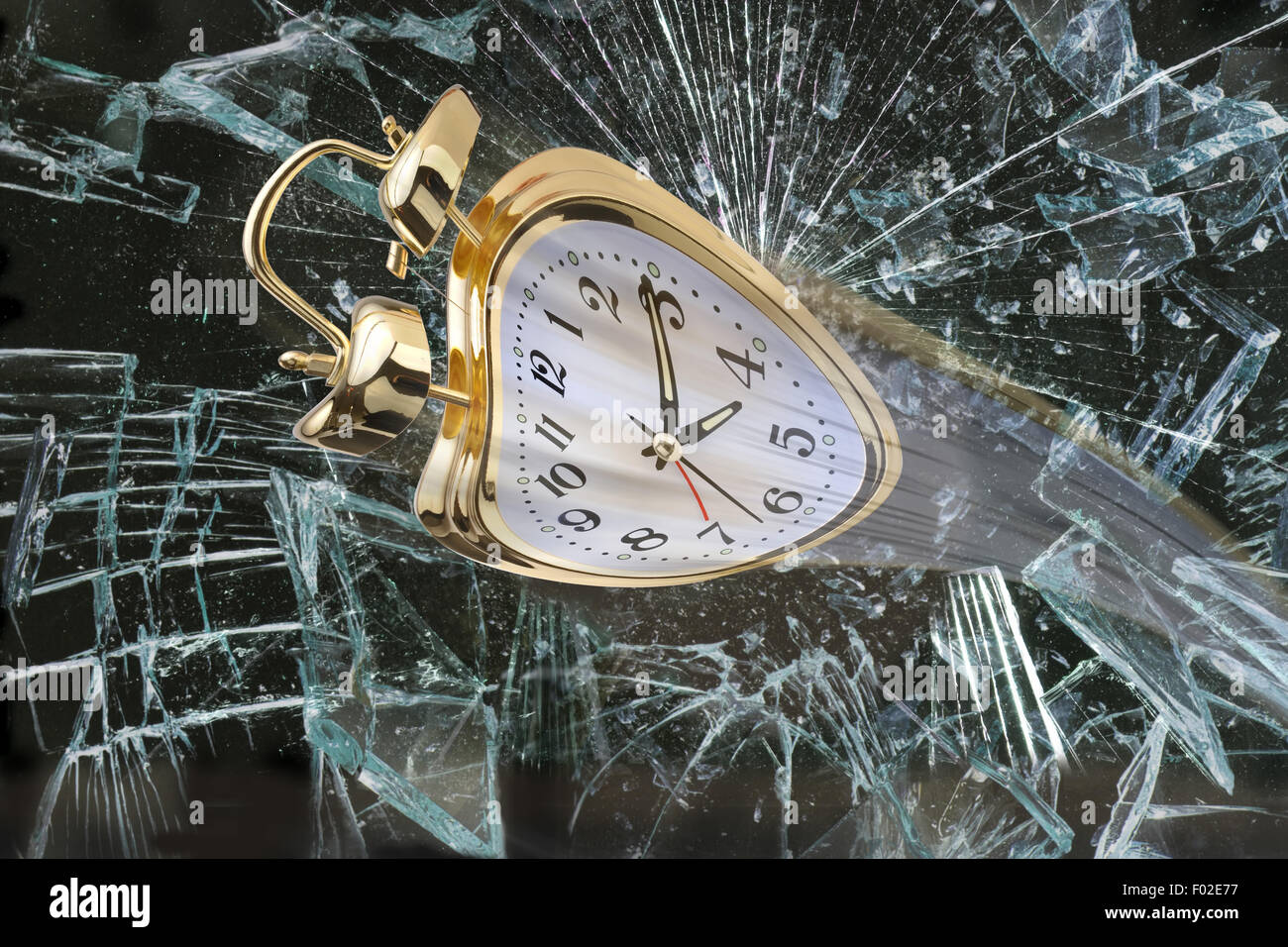 Alarm clock flying through broken window Stock Photo Alamy