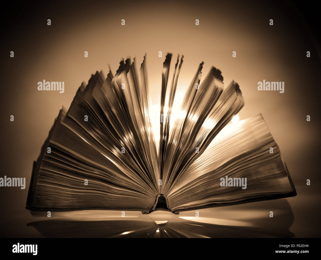 Open old book in sepia color Stock Photo