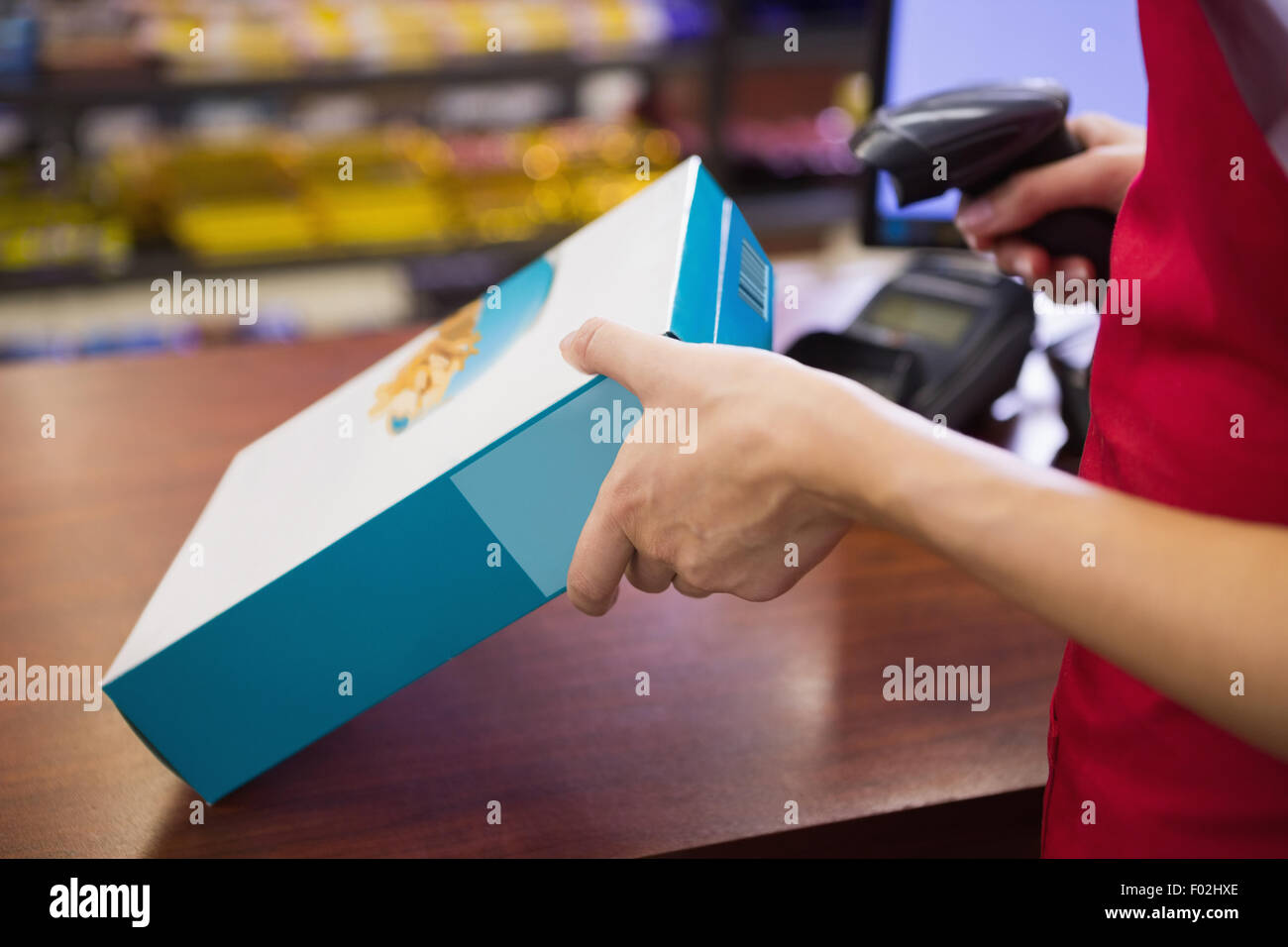 Female Worker Scanning Cereal Box Stock Photo Alamy