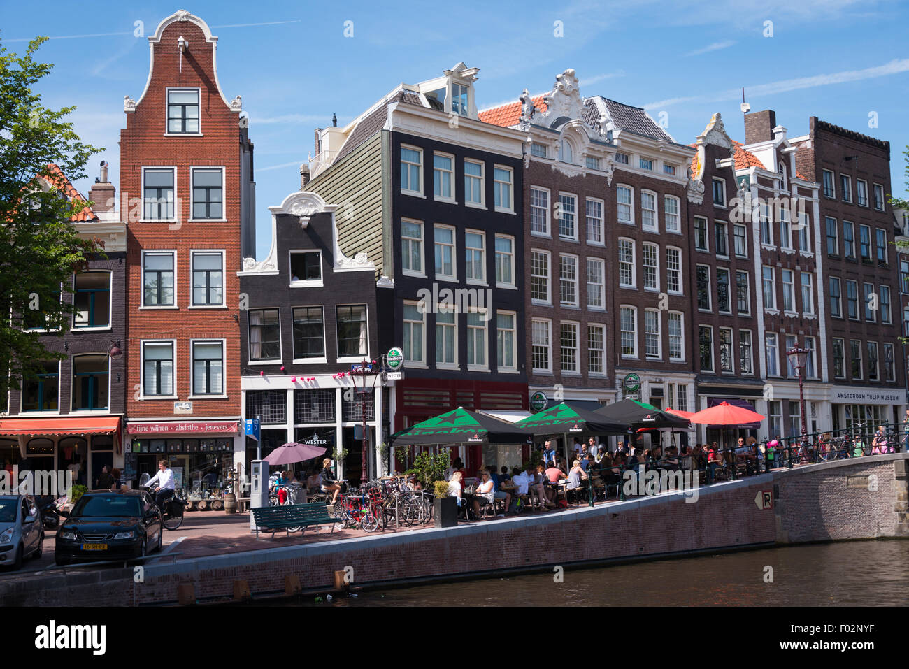 Traditional buildings in the Amsterdam canal area in the summer sunshine Stock Photo