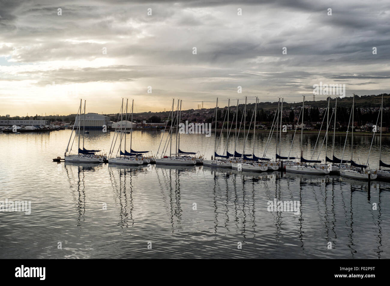 two yachts leave from harbour h