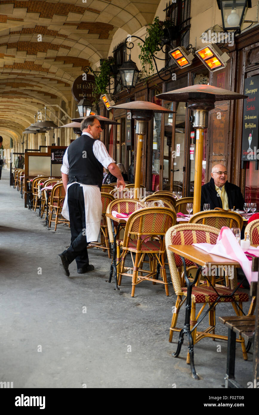 Waiter in Brasserie Mutzig, Paris, France Stock Photo
