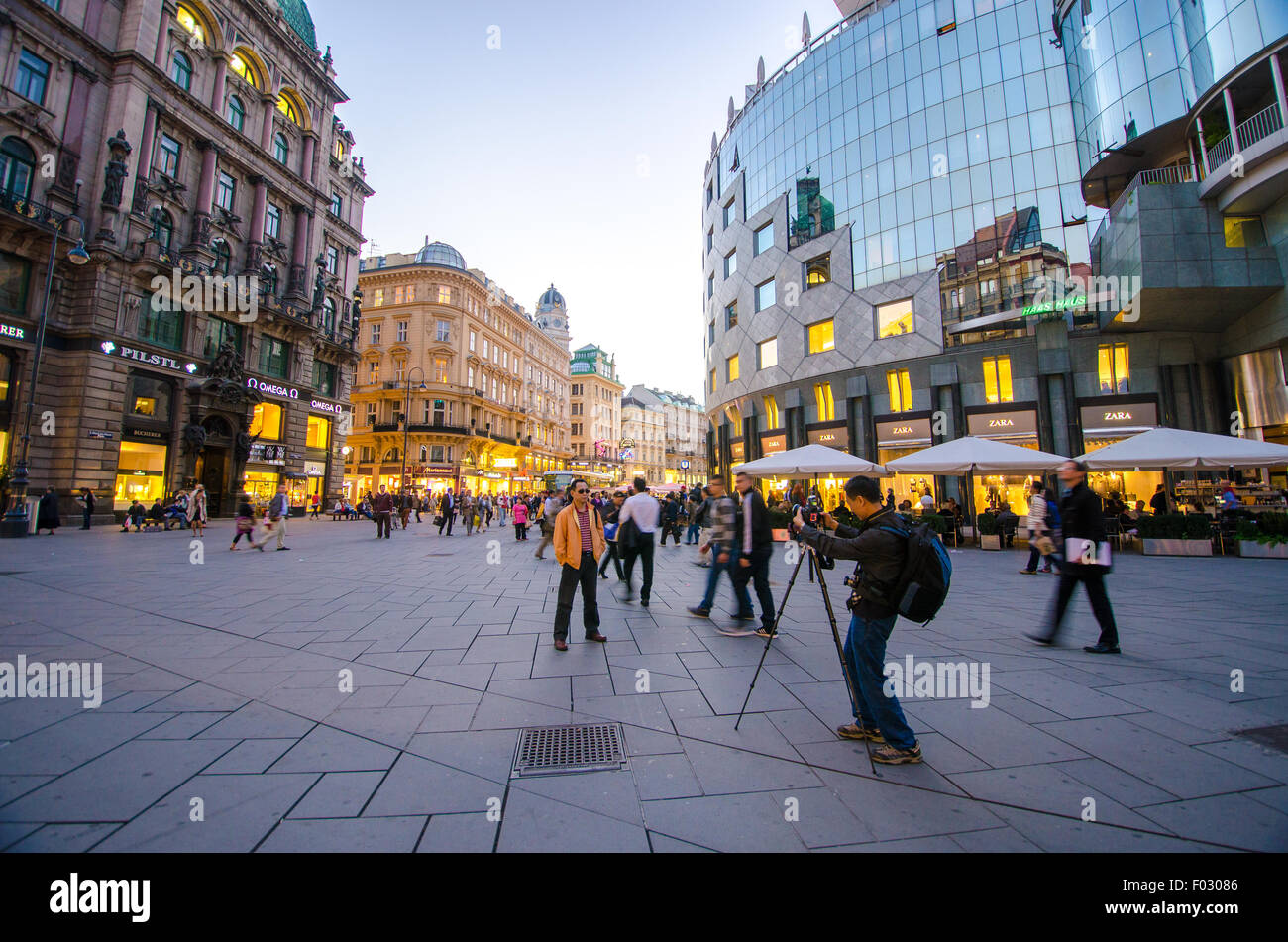 Some tourists taking pictures in the center of Vienna. Stock Photo