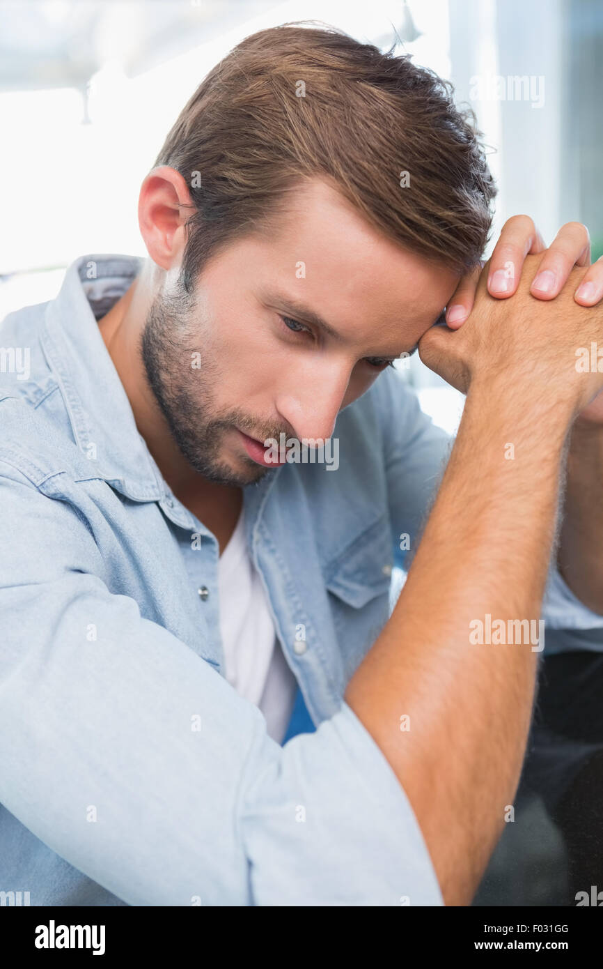 Upset young man Stock Photo - Alamy