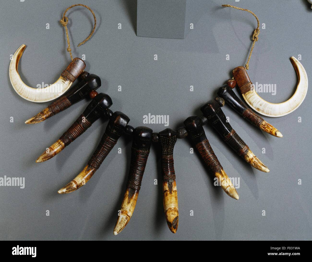 Tusk necklace hi-res stock photography and images - Alamy