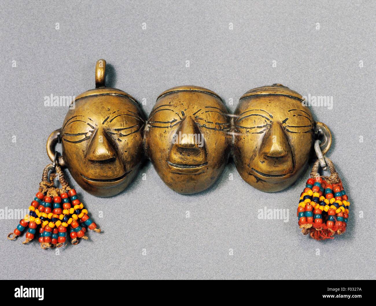 Men's necklace with pendants depicting faces and decorated with colored beads worn by headhunters, Konyak and Wancho, Nagaland, India. Stock Photo