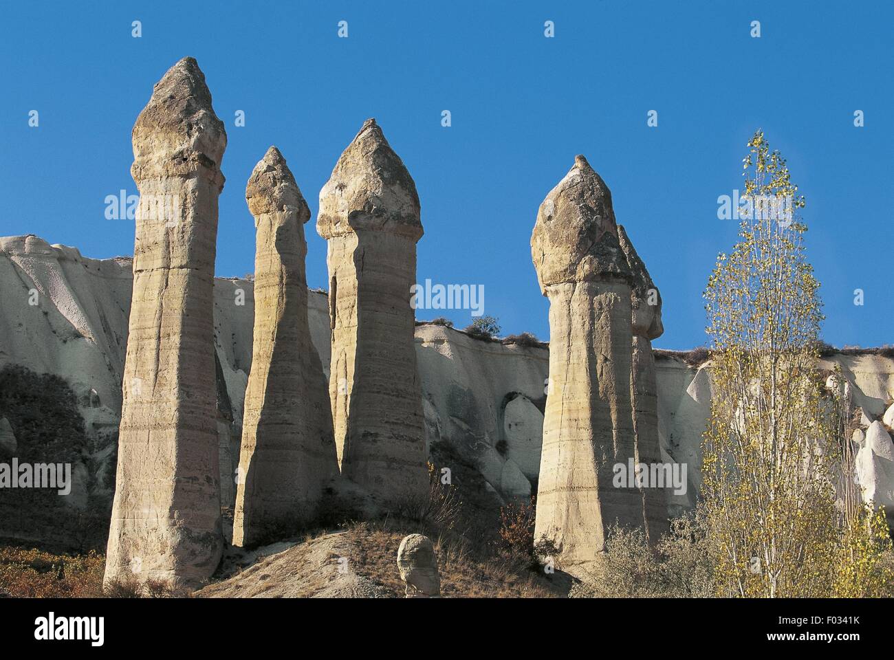 Turkey - Cappadocia - Zelve - Ask Valley. The "fairy chimneys", conical  rock formations (Peri Bacalari Stock Photo - Alamy