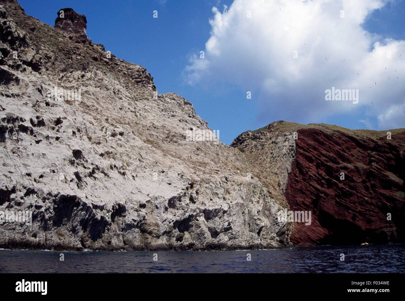 Cliff at Cala Rossa, Capraia Island, Arcipelago Toscano National Park, Tuscany, Italy. Stock Photo