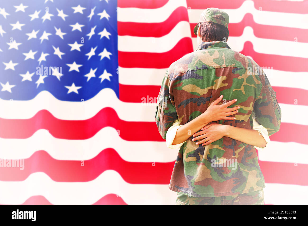 Composite image of army wife reunited with husband Stock Photo