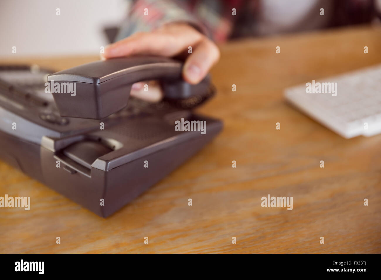 Hipster businessman answering the phone Stock Photo