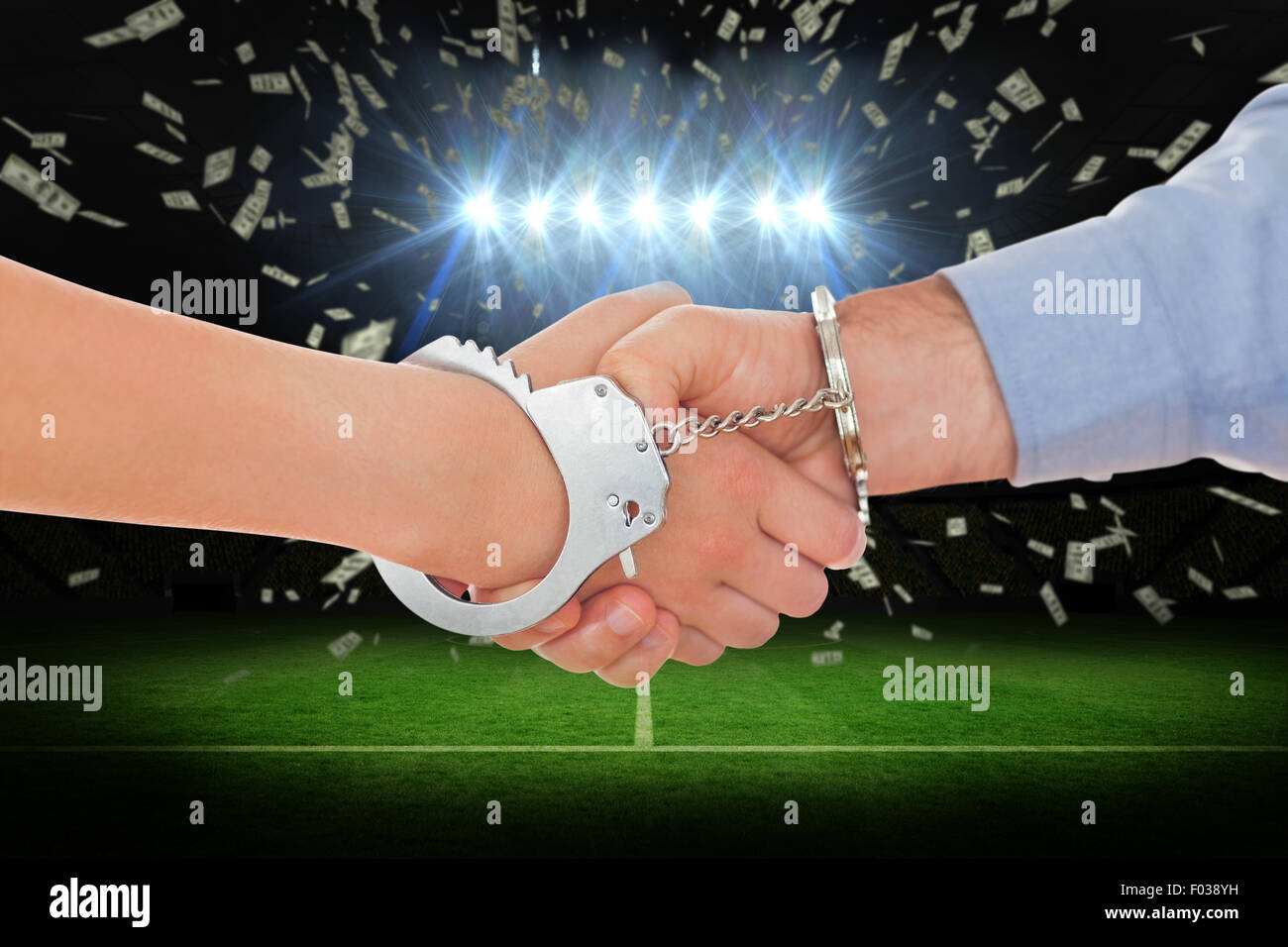 Composite image of handcuffed business people shaking hands Stock Photo