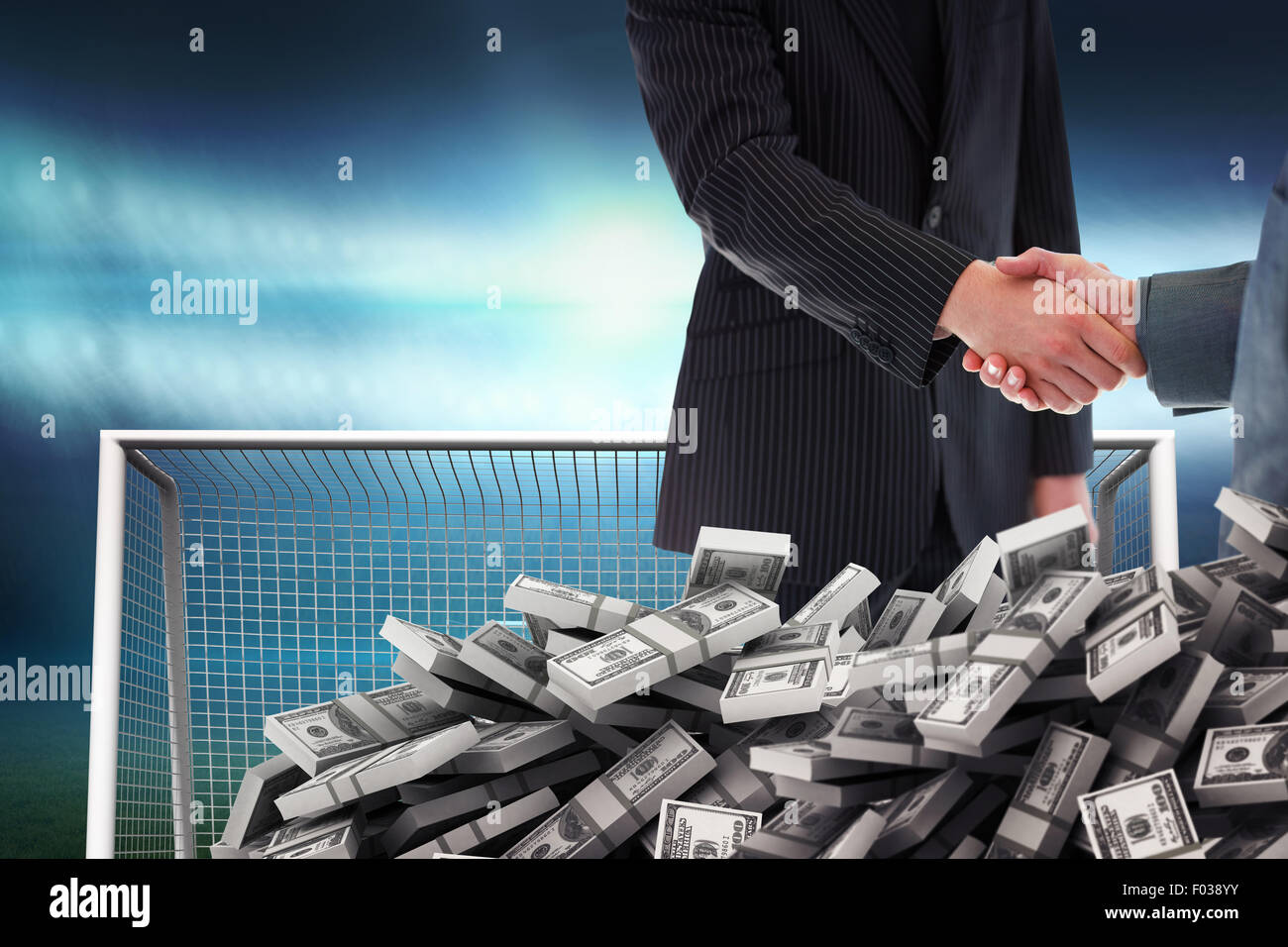 Composite image of business people shaking hands Stock Photo