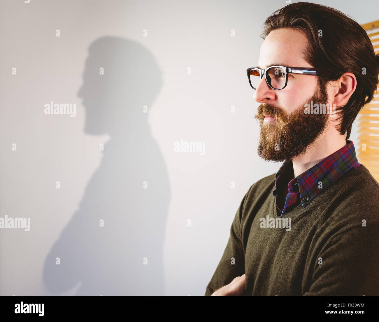 Hipster businessman in side profile Stock Photo