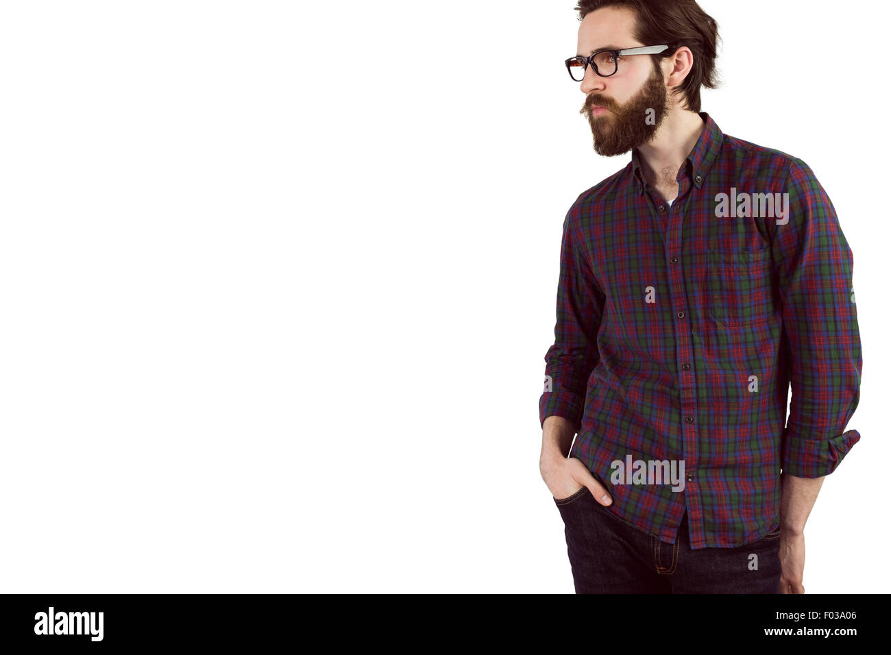 Handsome hipster with hands in pockets Stock Photo