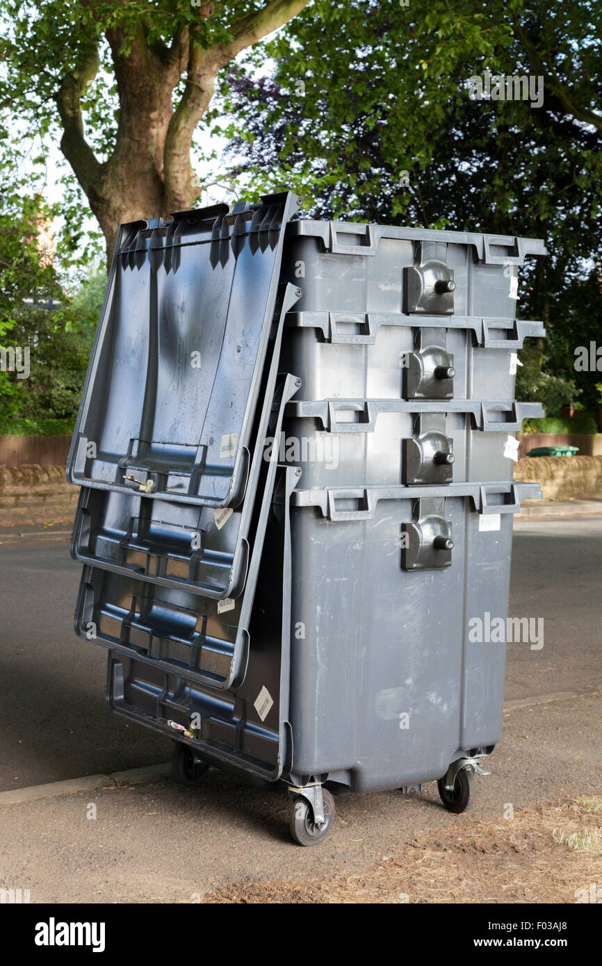 Stack of large commercial or trade waste wheelie bins, Nottingham, England, UK Stock Photo