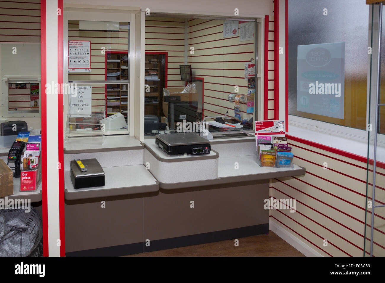 Main style Post Office branch refit and modernization new fortress counter being fitted Stock