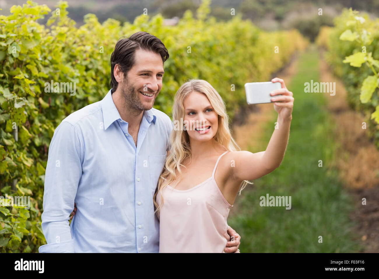 Young happy couple taking a selfie Stock Photo - Alamy