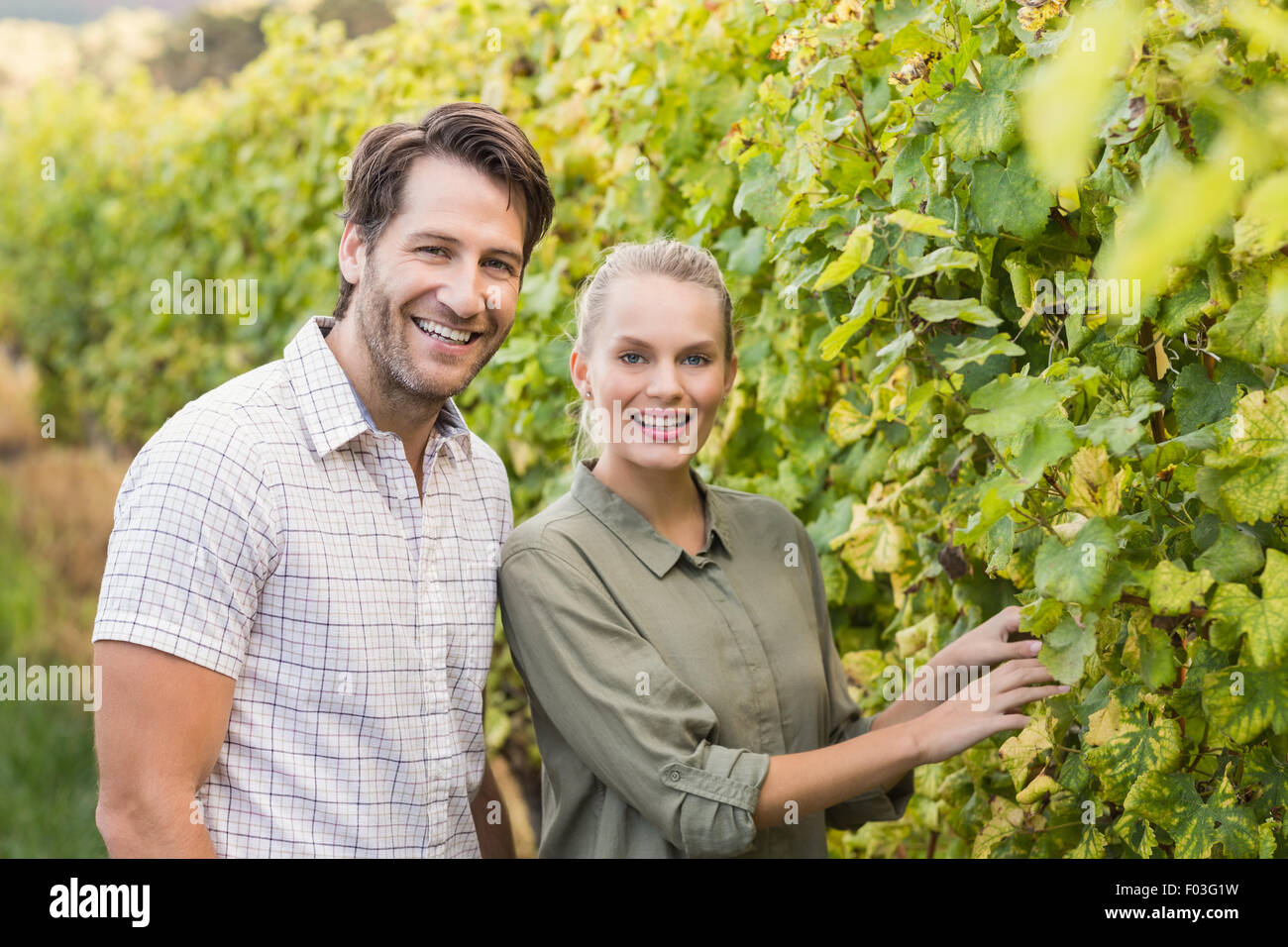 Two young happy vintners Stock Photo