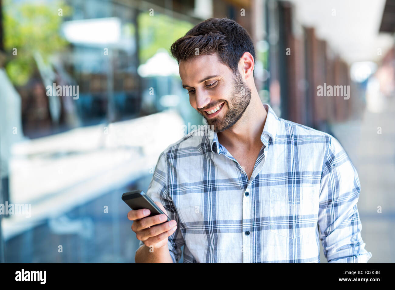 Man in city using smartphone hi-res stock photography and images - Alamy