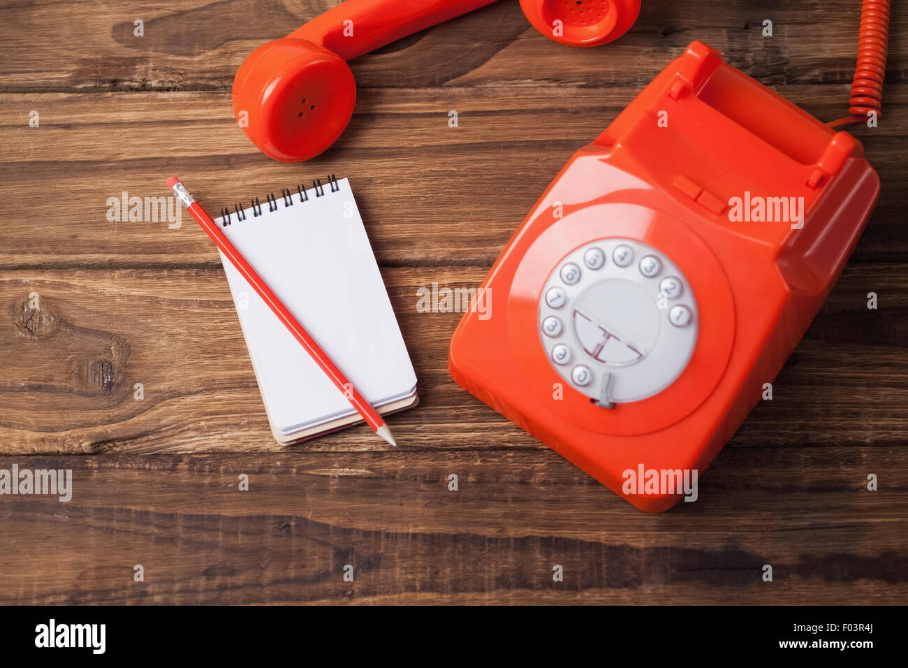 Telephone on table with notepad Stock Photo Alamy