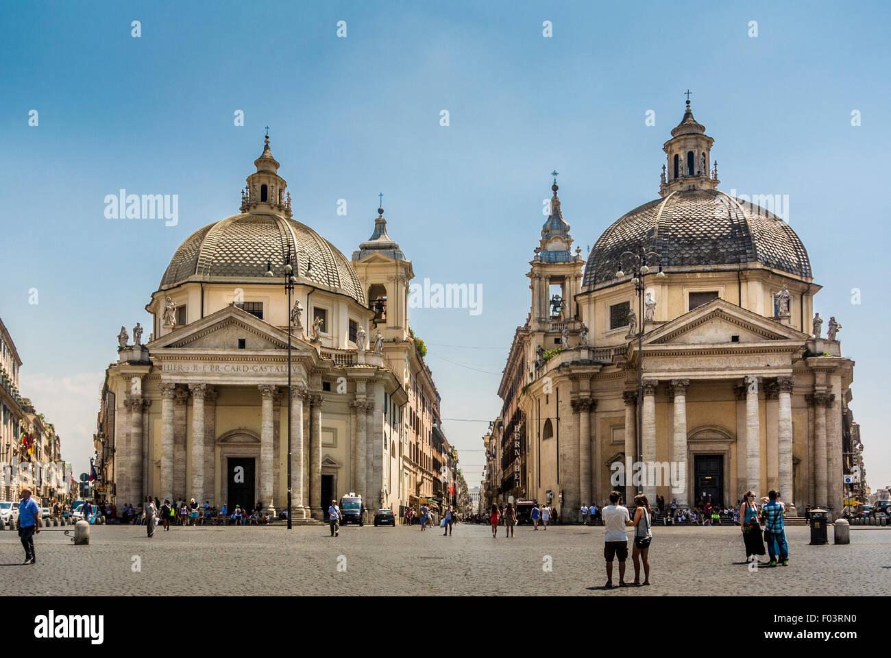 The "twin" churches of Santa Maria di Montesanto (left) and Santa Maria dei Miracoli (right), seen from Piazza del Popolo. Rome, Stock Photo