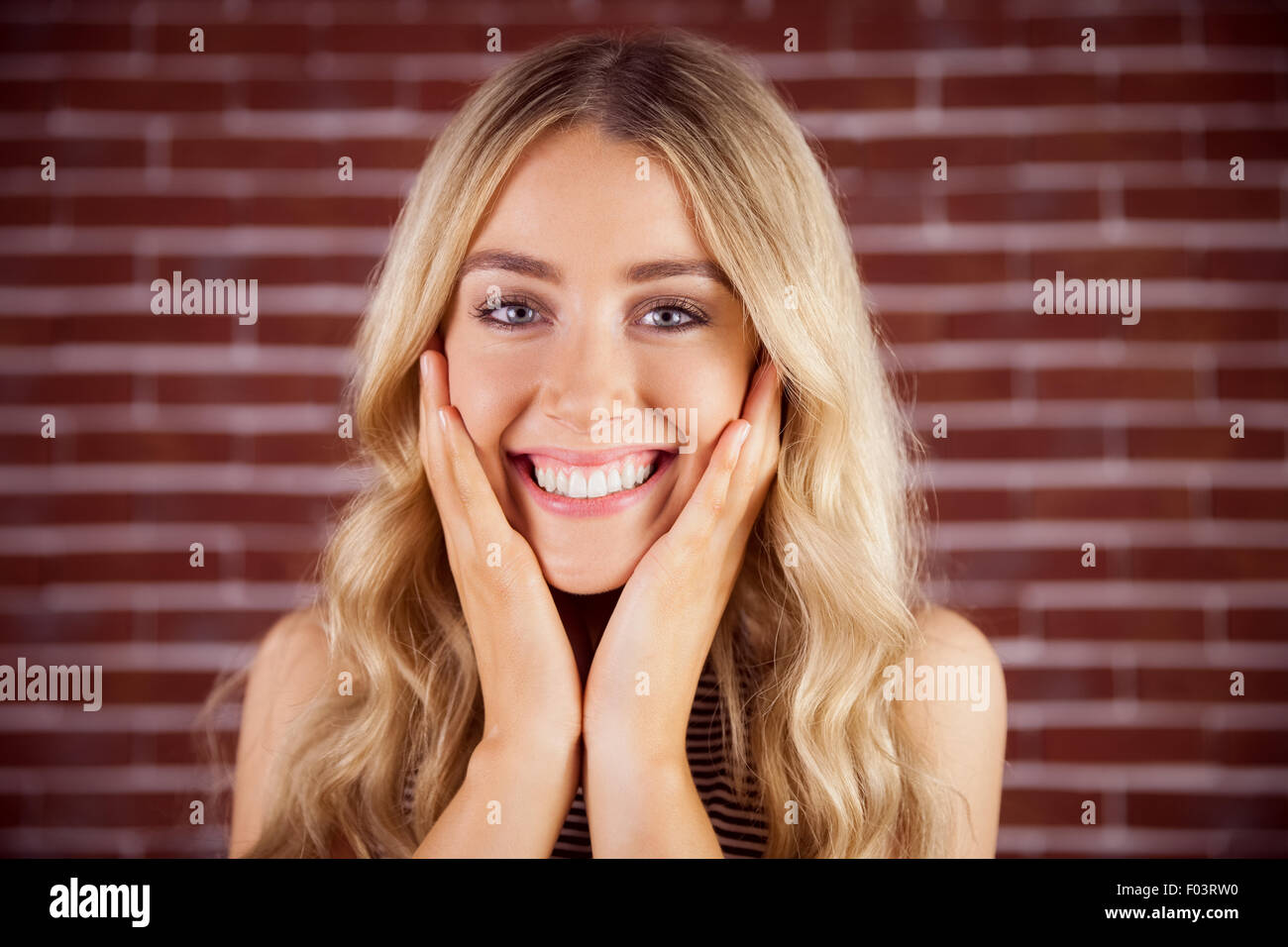 Beautiful blonde woman being glad Stock Photo