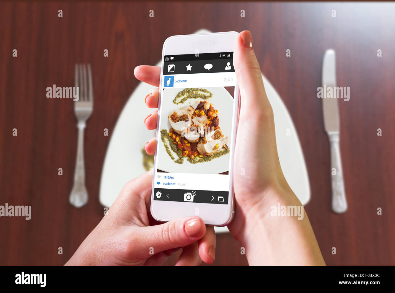 Hand holding knife and fork hi-res stock photography and images - Alamy