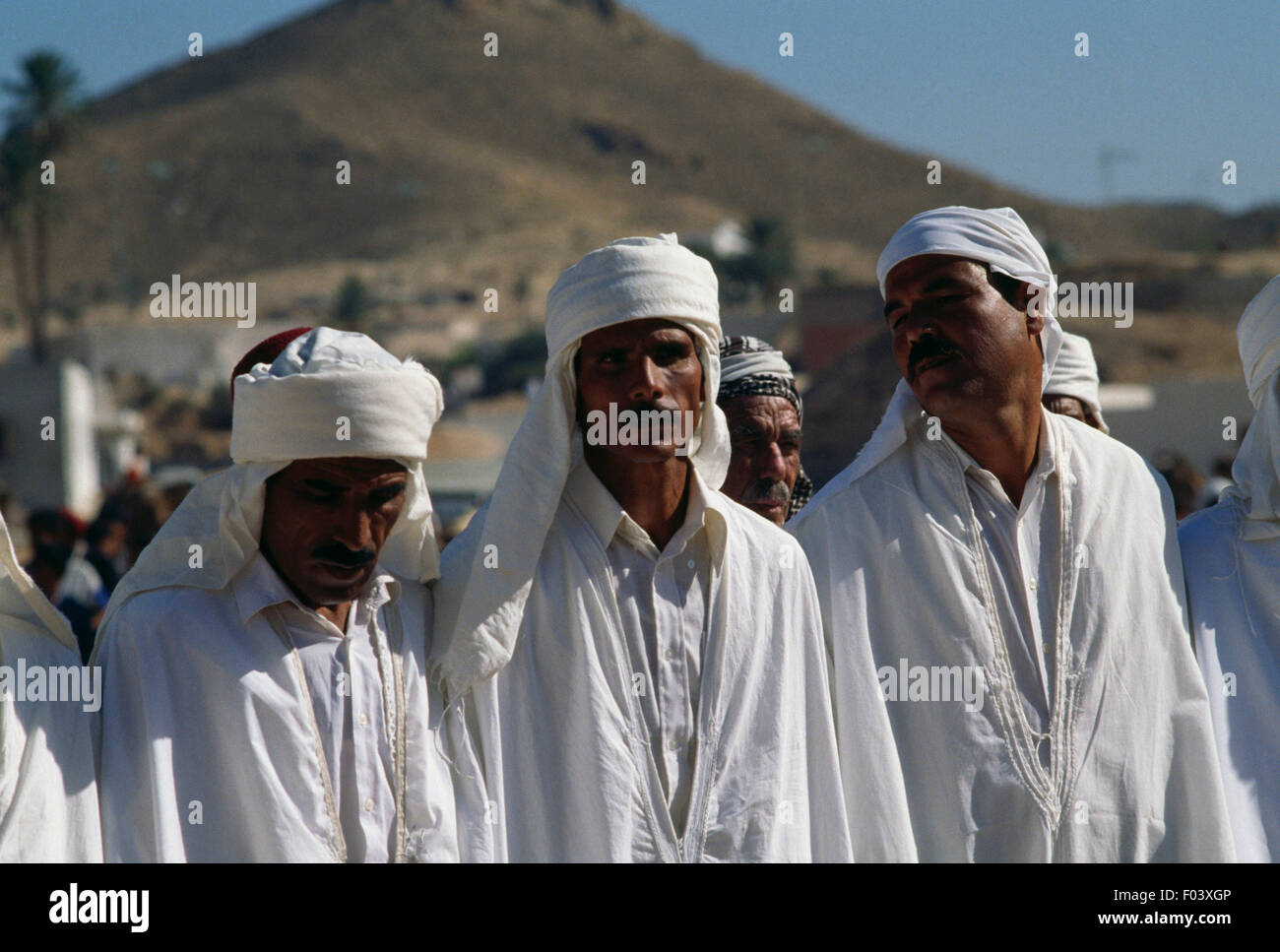 Group of men in traditional clothes, Matmata Berber festival, Tunisia. Stock Photo