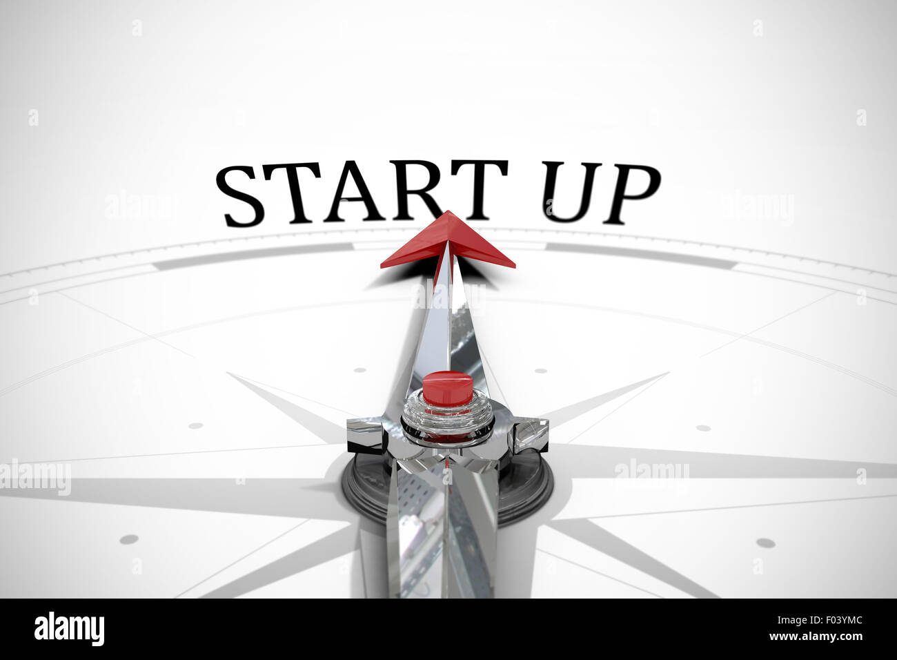 Start up against compass Stock Photo - Alamy