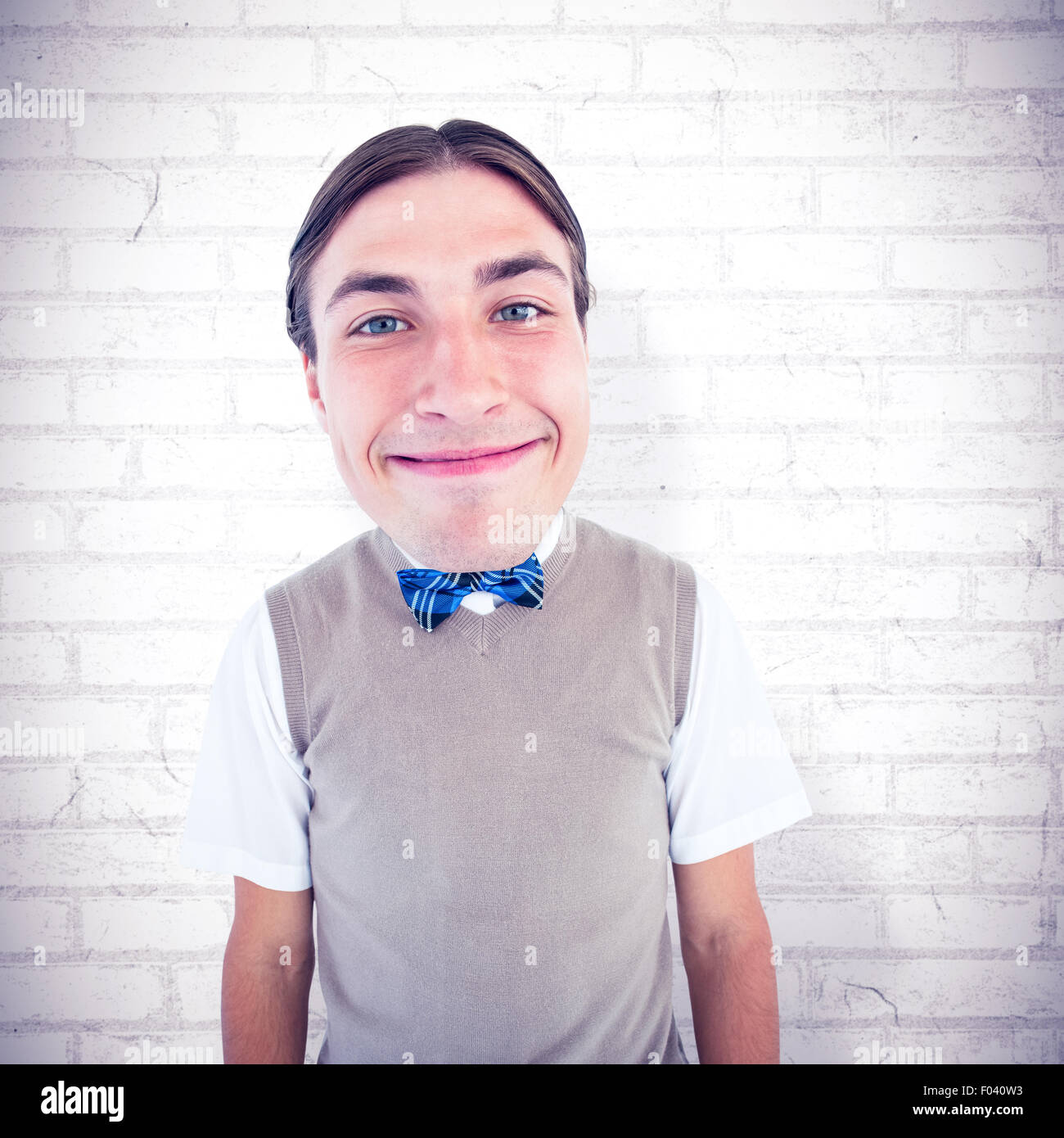 Composite image of nerd smiling Stock Photo