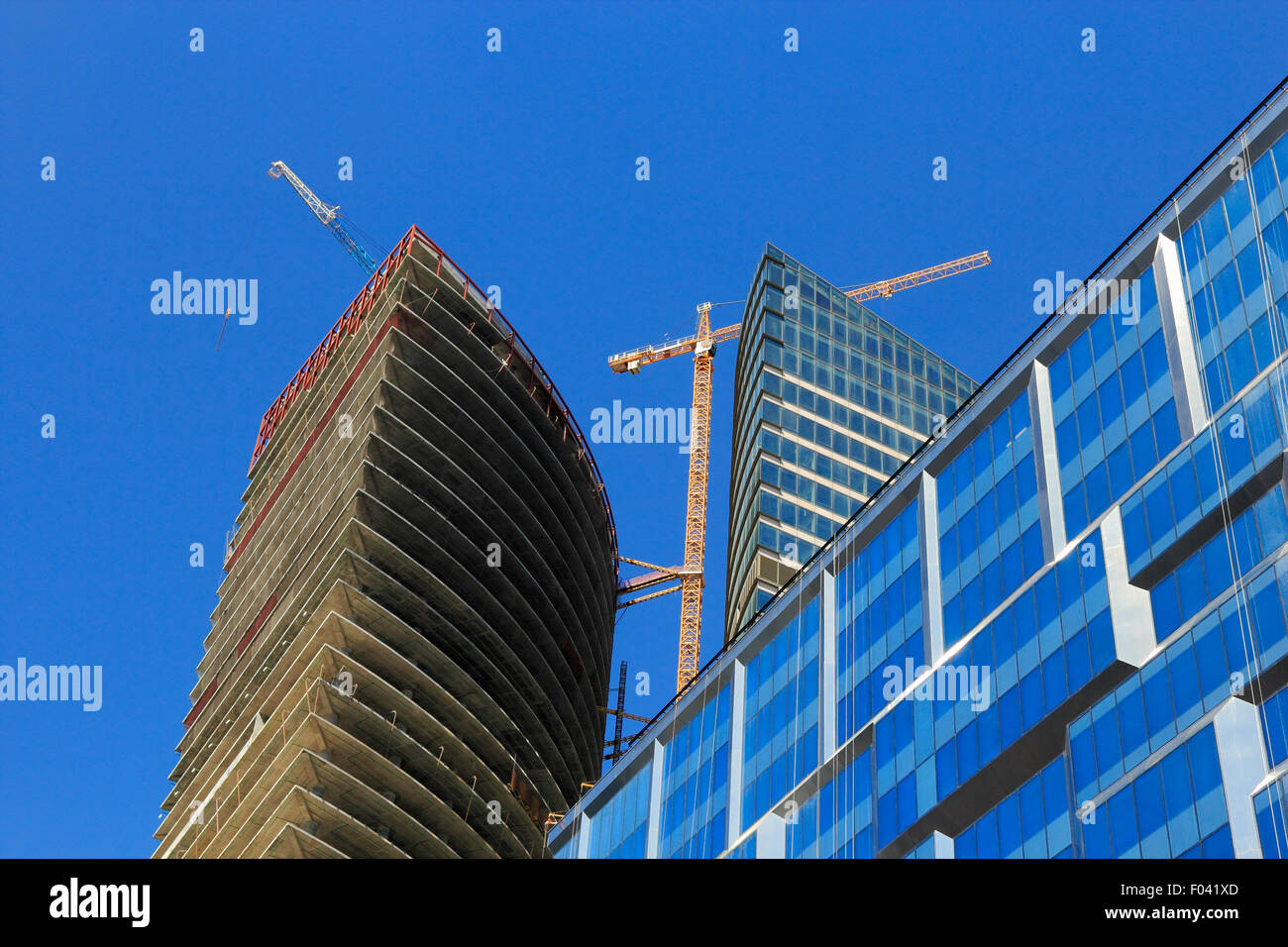 Group of contemporary office buildings is under construction. Stock Photo