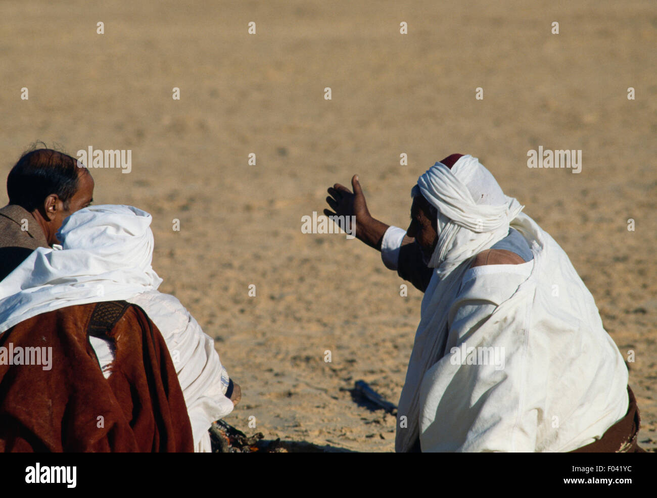 Men in traditional clothes, Festival of the Sahara in Douz, Tunisia. Stock Photo