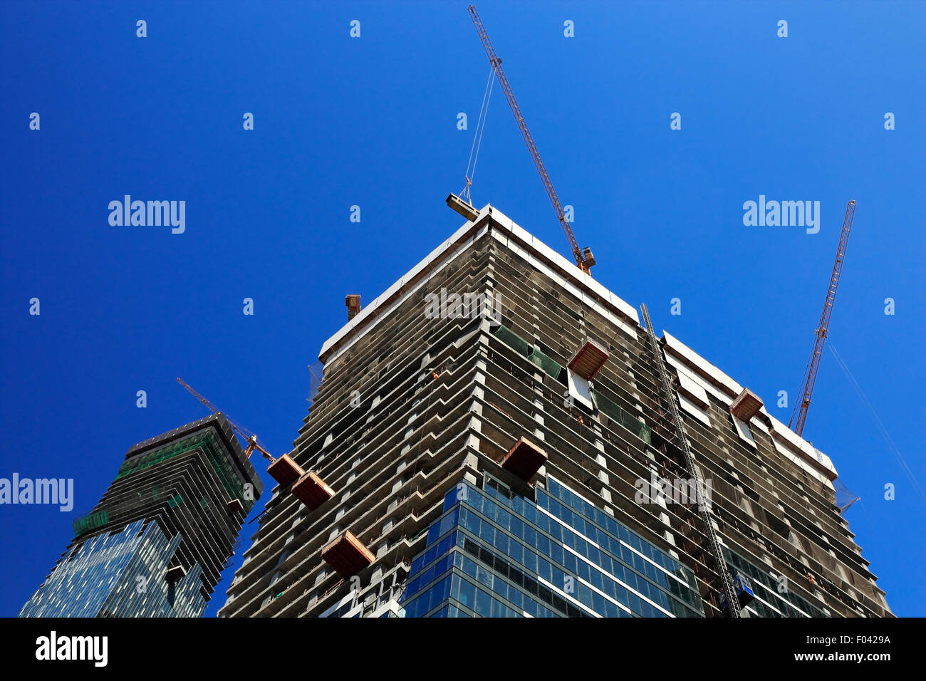 A picture of two contemporary buildings under construction. Stock Photo