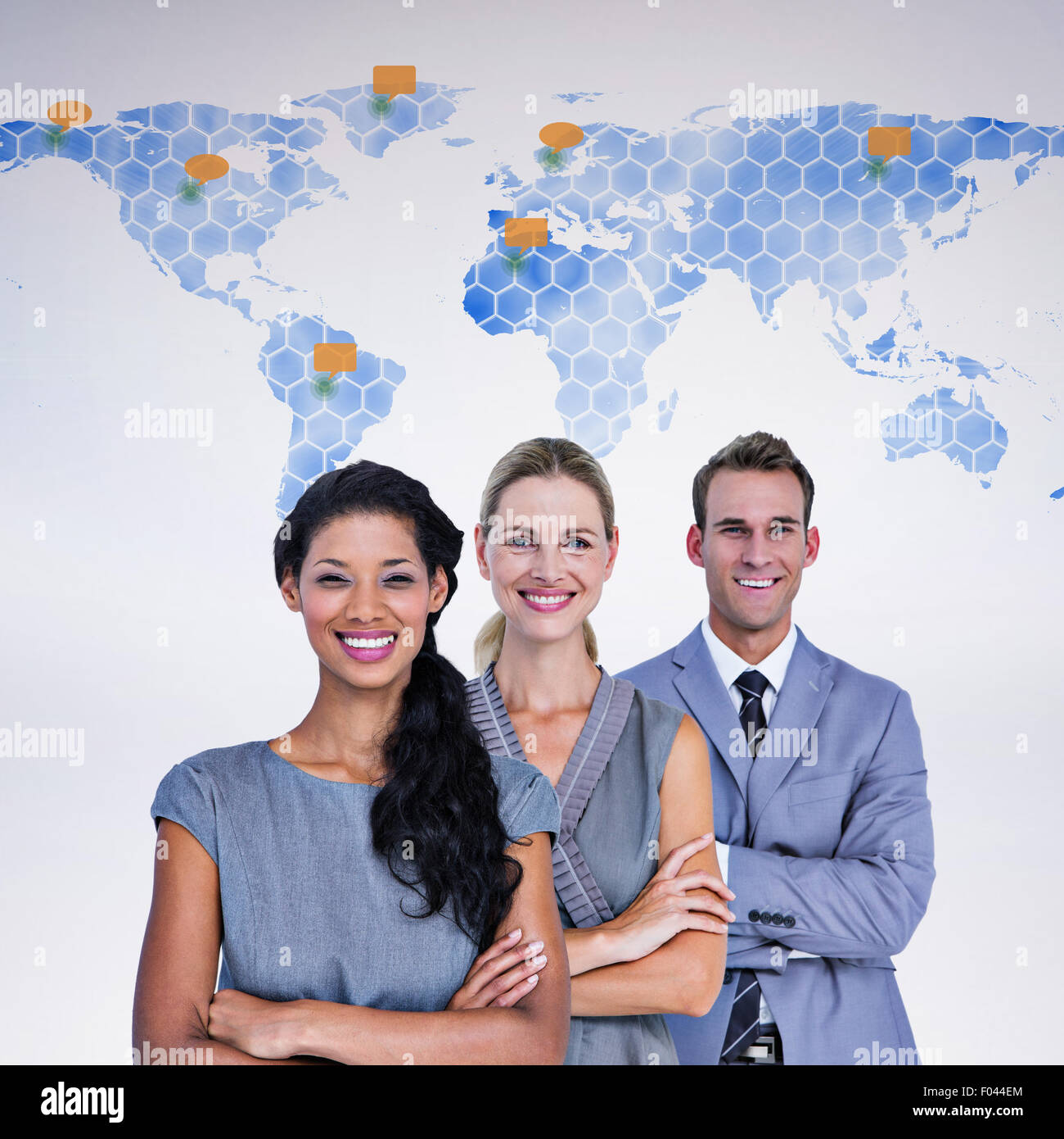 Composite image of happy business team smiling at camera Stock Photo ...