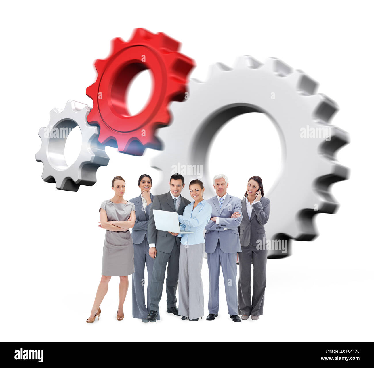 Composite image of business team looking at camera Stock Photo - Alamy