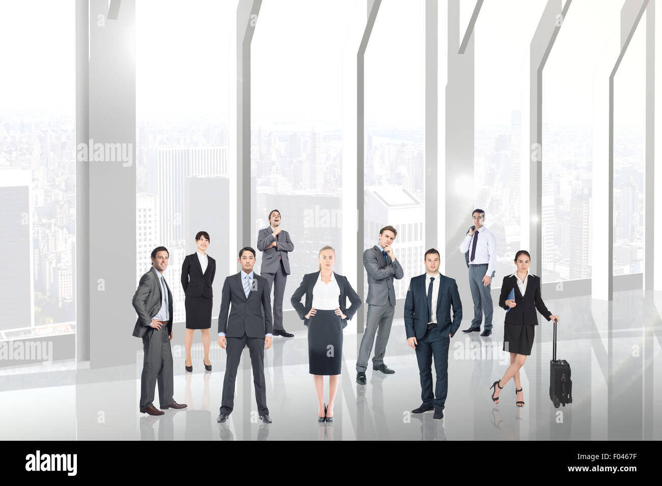Composite image of business team Stock Photo - Alamy