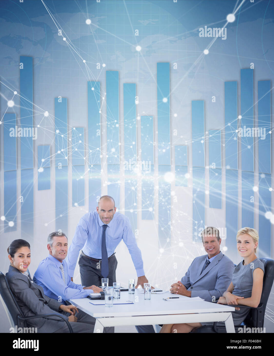Composite image of happy business people looking at camera Stock Photo ...