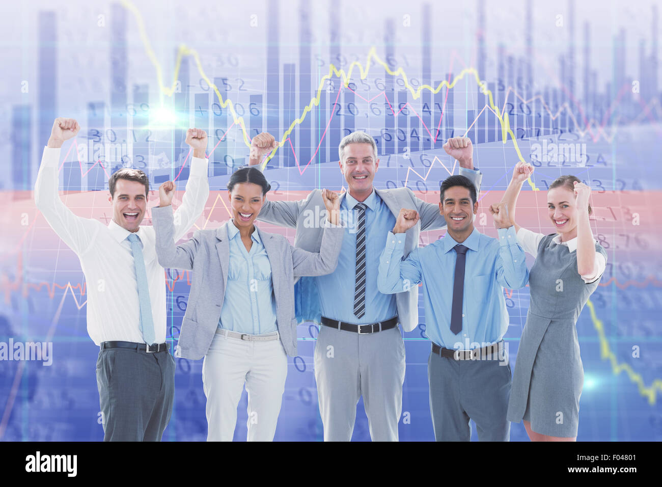 Composite image of business people cheering in office Stock Photo