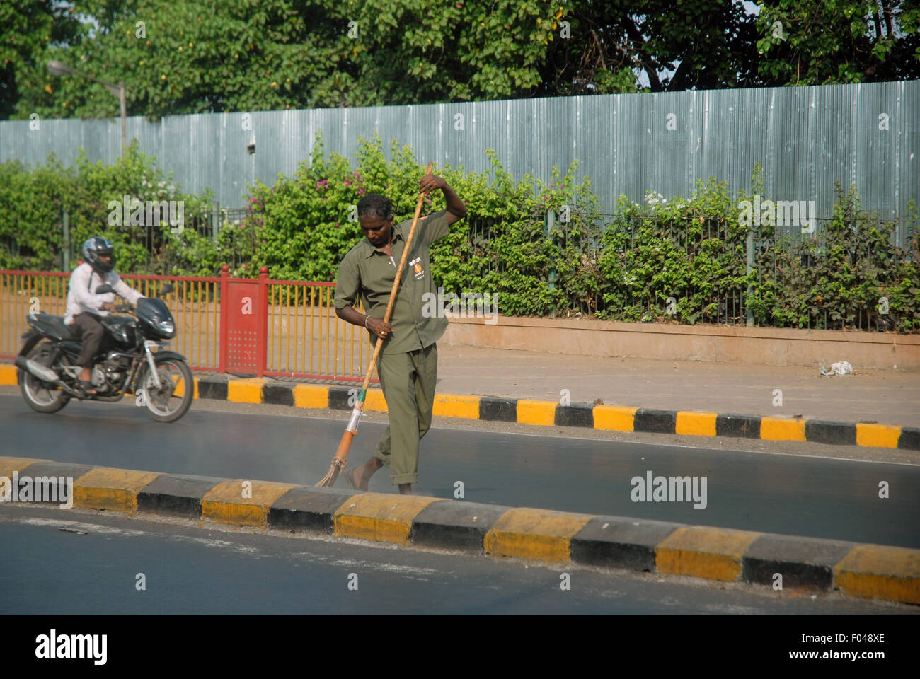 Man cleaning streets, Mumbai, Maharashtra, India Stock Photo Alamy