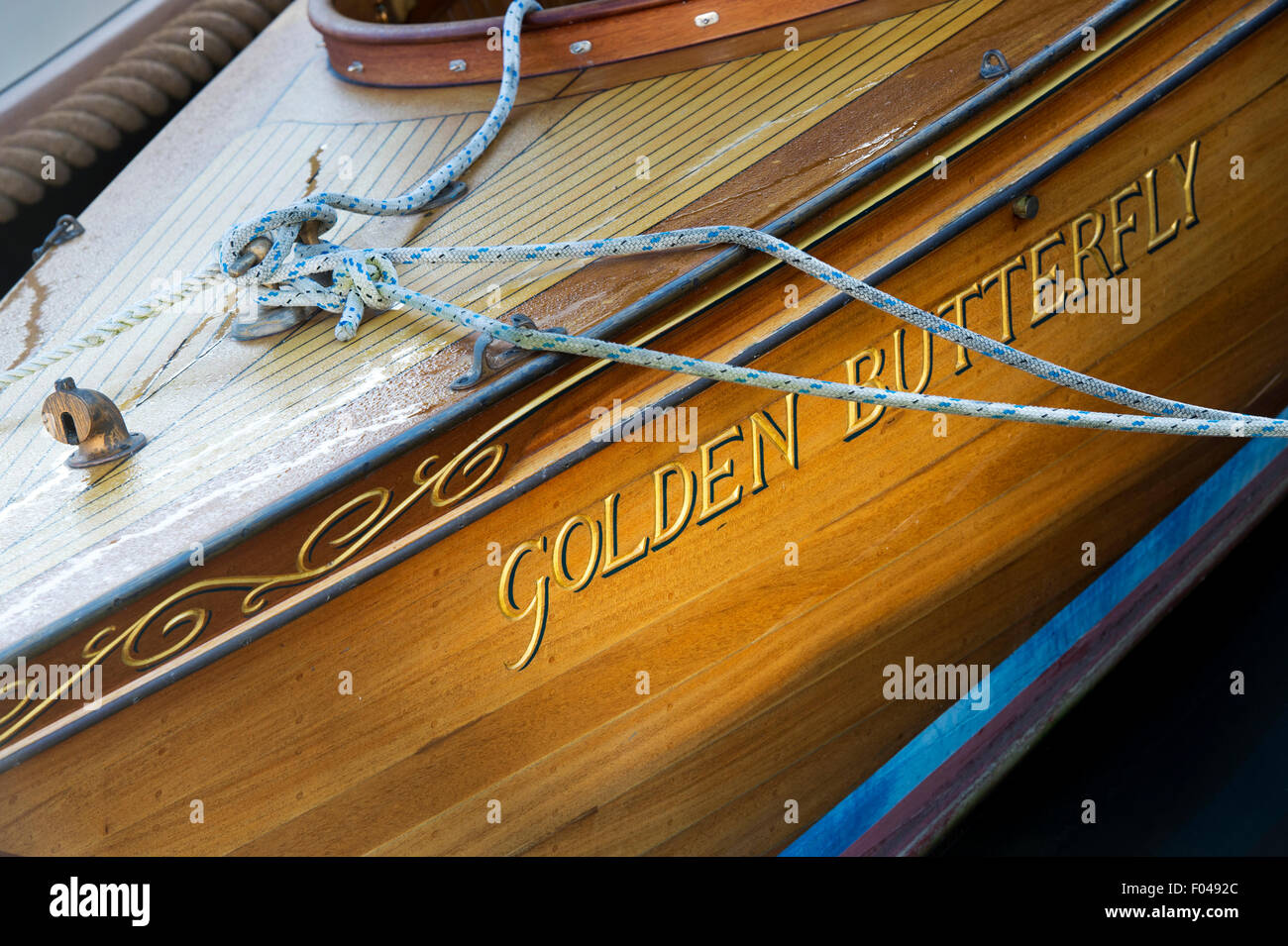 Electric Gentleman's launch 'Golden Butterfly' moored at Henley on Thames, Oxfordshire, England Stock Photo