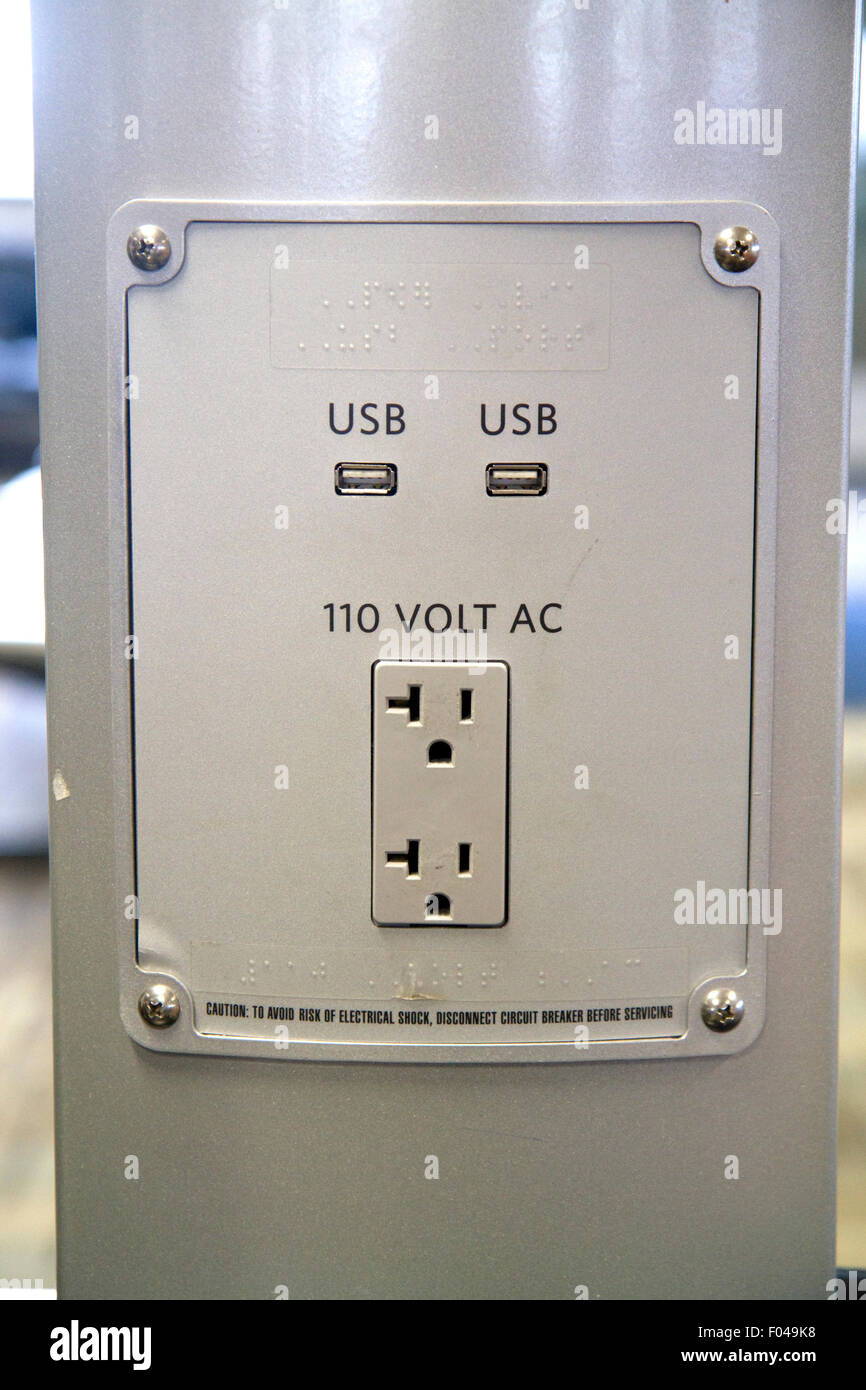 Phone and personal device charging station at the Minneapolis Saint Paul International airport located in Hennepin County, Minne Stock Photo