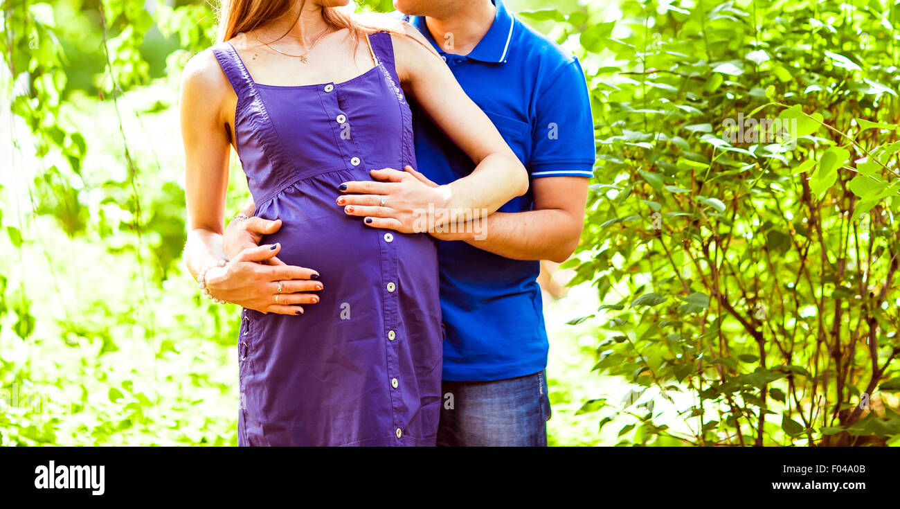 pregnant woman and her husband in the park Stock Photo - Alamy