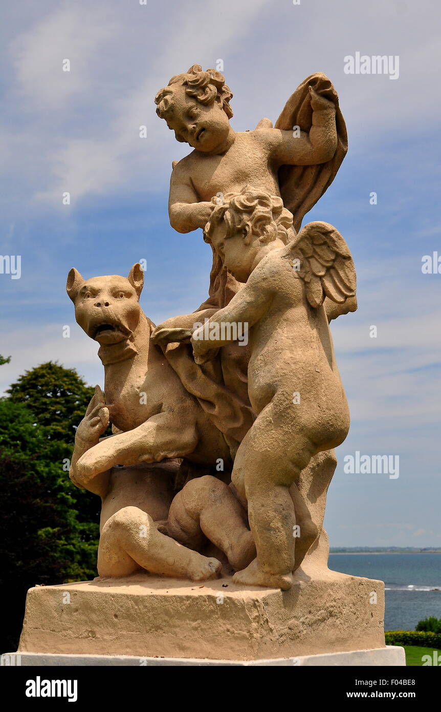Newport, Rhode Island:  Classical statuary with cupids in the gardens at 1898-1902 Rosecliff Mansion * Stock Photo