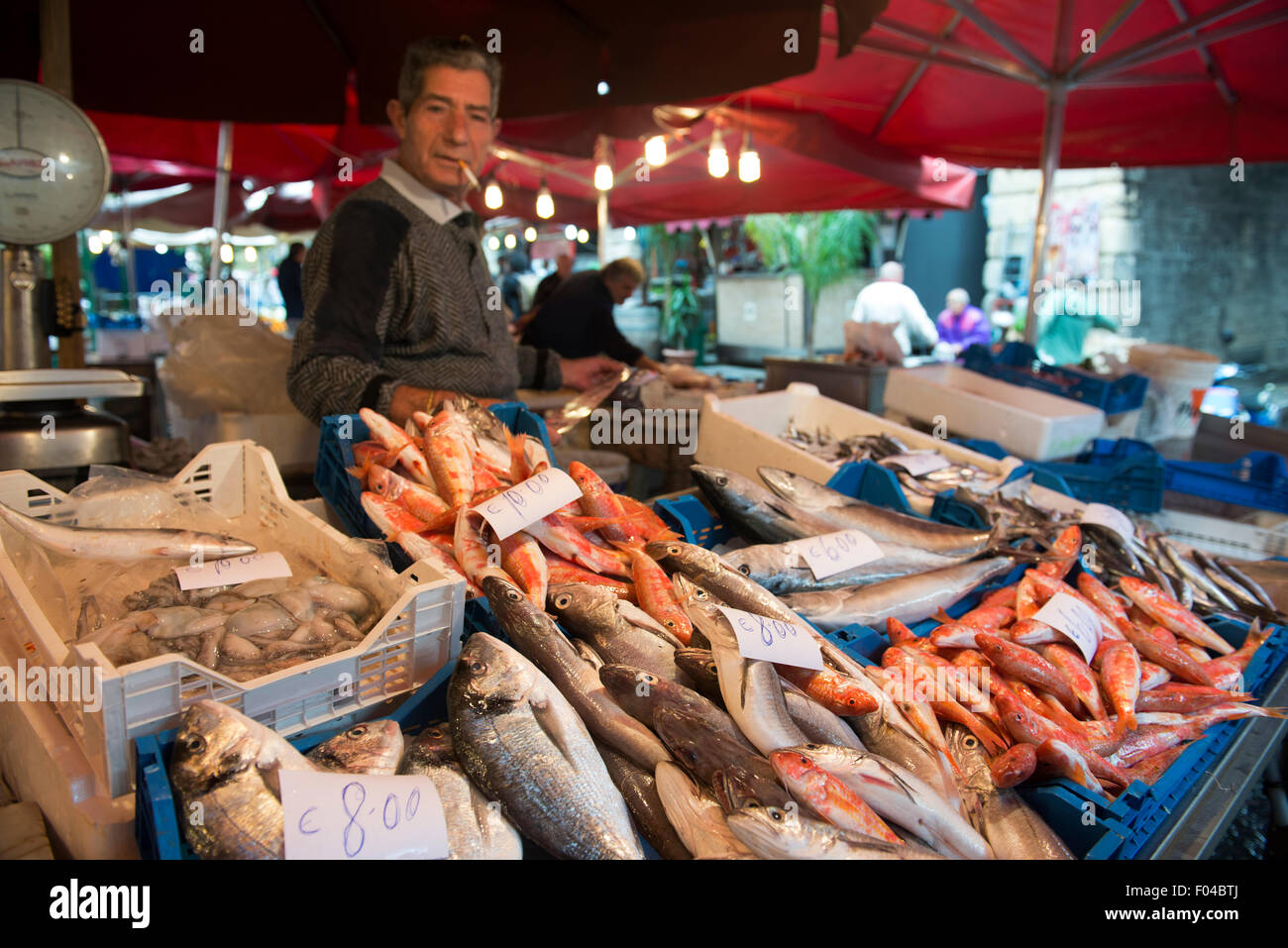 Fresh fish and seafood sold at the vibrant seafood market in Catania. Stock Photo