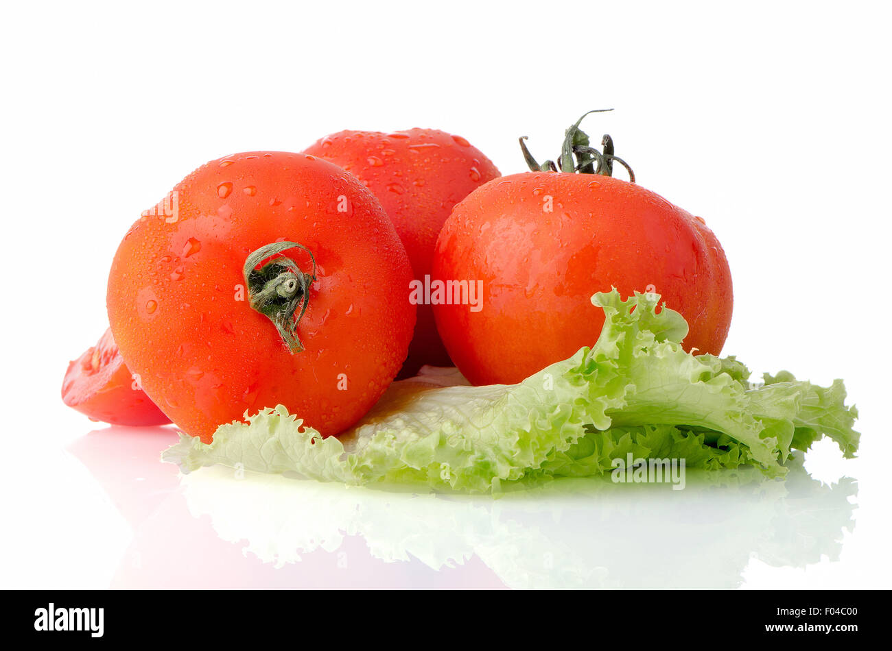 Red tomatoes isolated on white background Stock Photo - Alamy