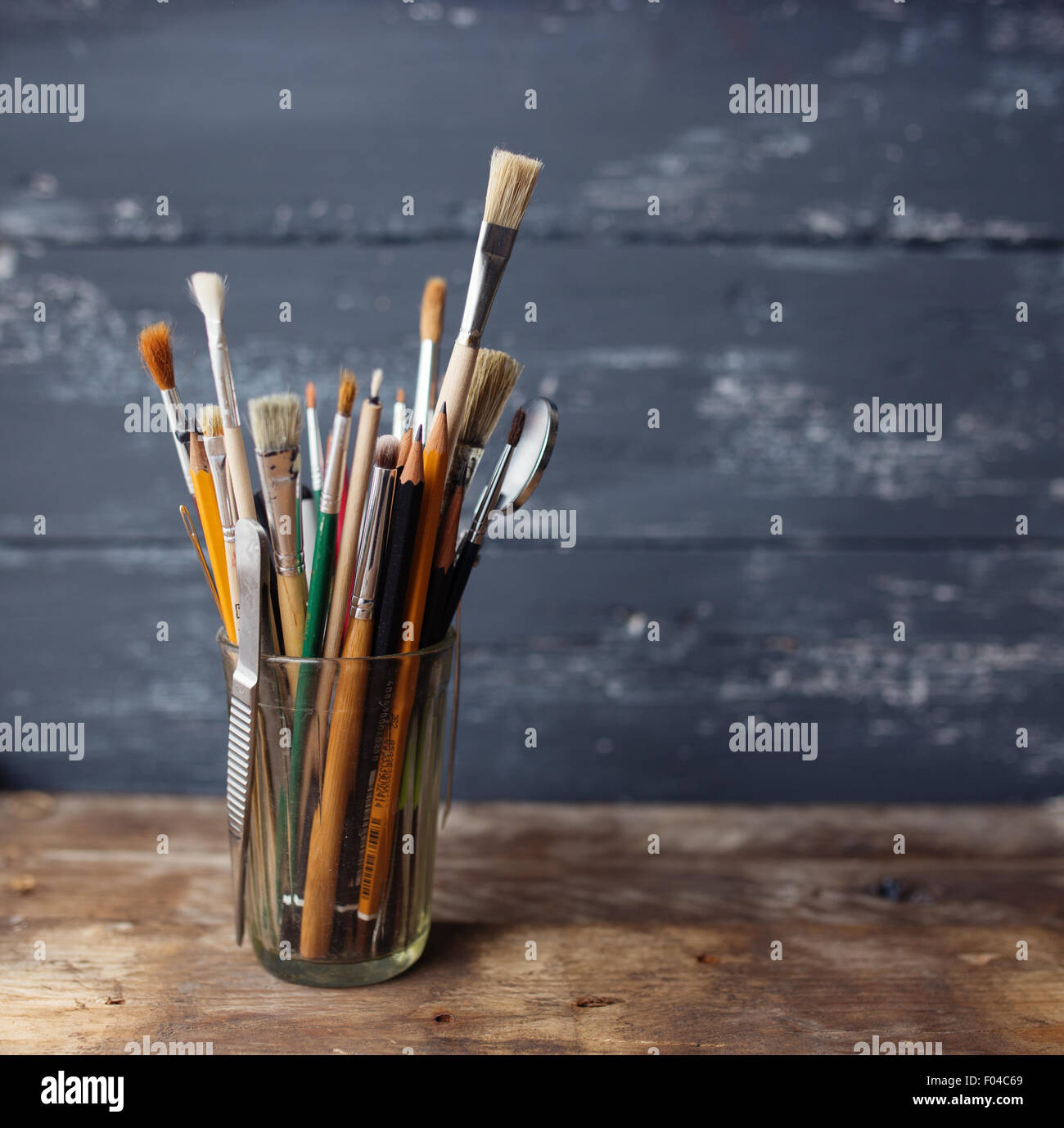 Set of paintbrushes on a wood background Stock Photo