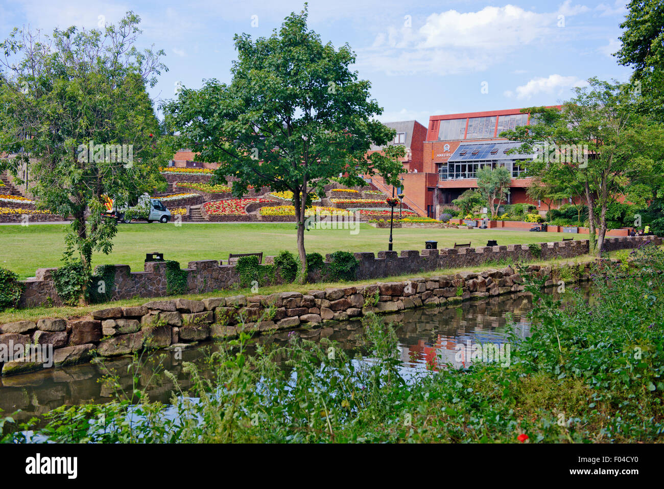 Ankerside Shopping Centre and Castle Park gardens with Anker River, Tamworth, Staffordshire Stock Photo