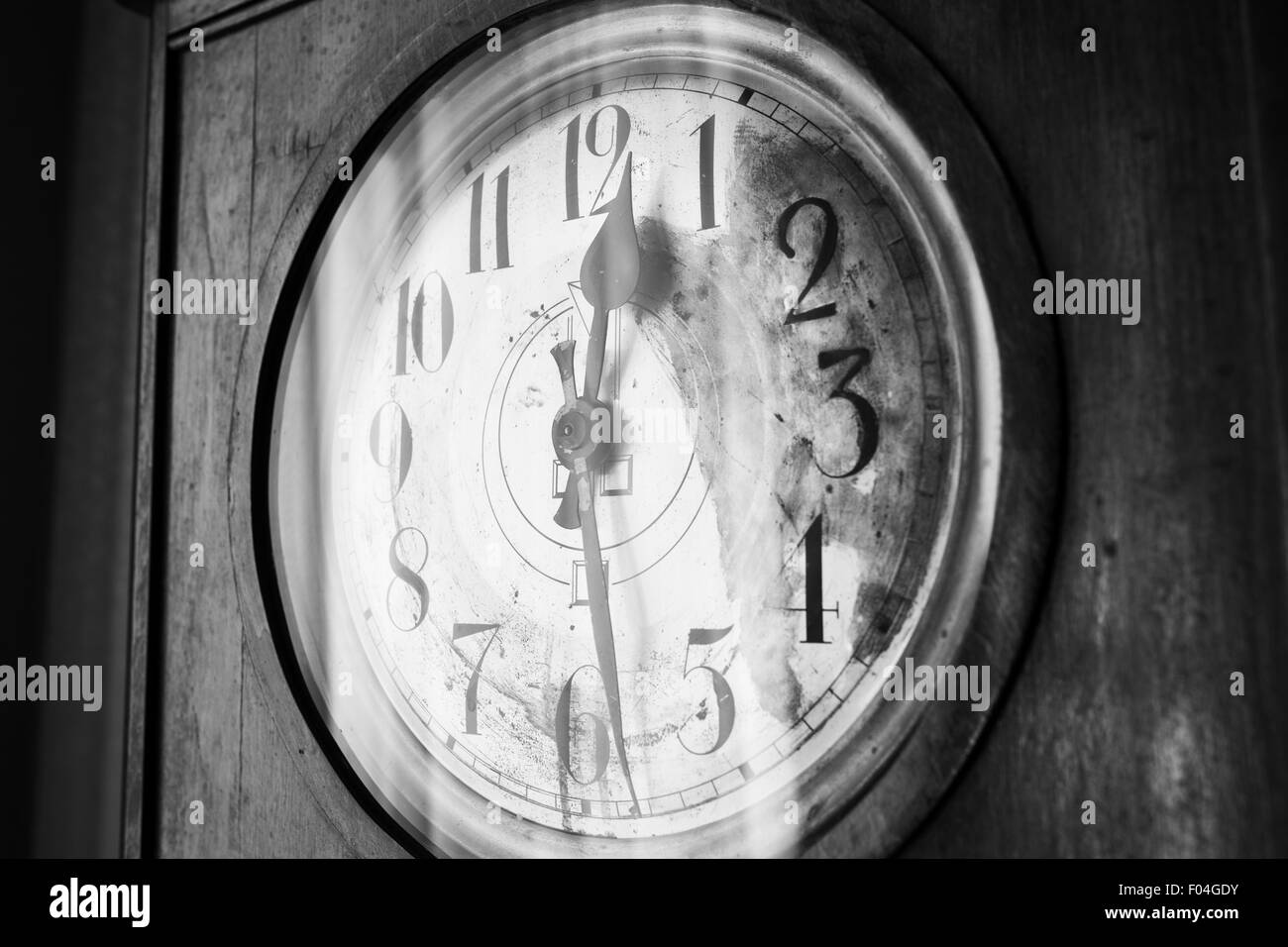 Antique grandfather clock, black and white photo, close up photo Stock Photo